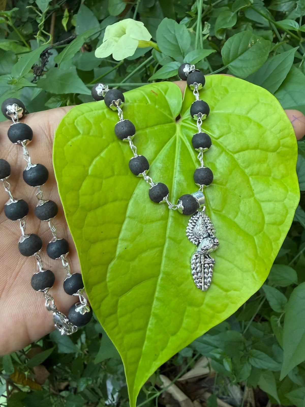 Karungali German silver mala with Vel Peacock Pendant